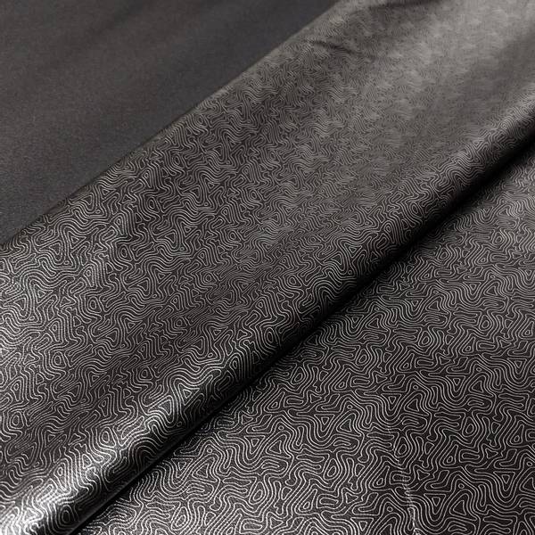 Bilde av Softshell light - sort matt med mønstret vrange